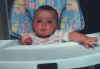 In her highchair